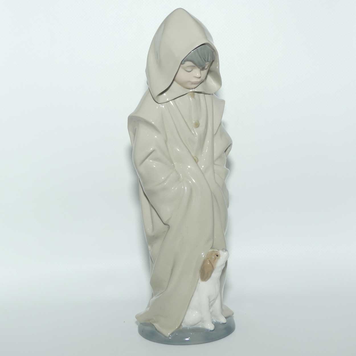 Nao figure Boy in Raincoat with Puppy Dog at Feet