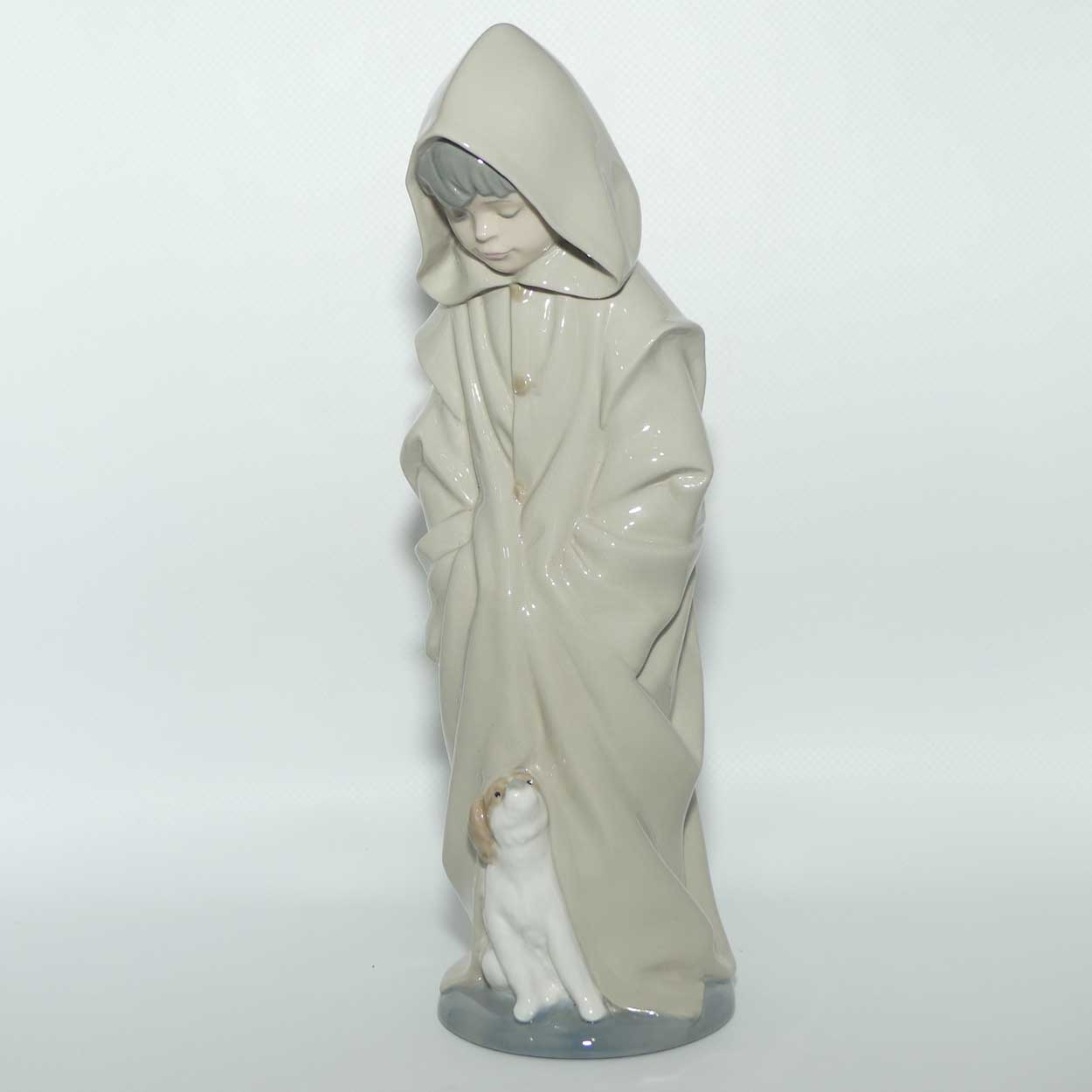 Nao figure Boy in Raincoat with Puppy Dog at Feet