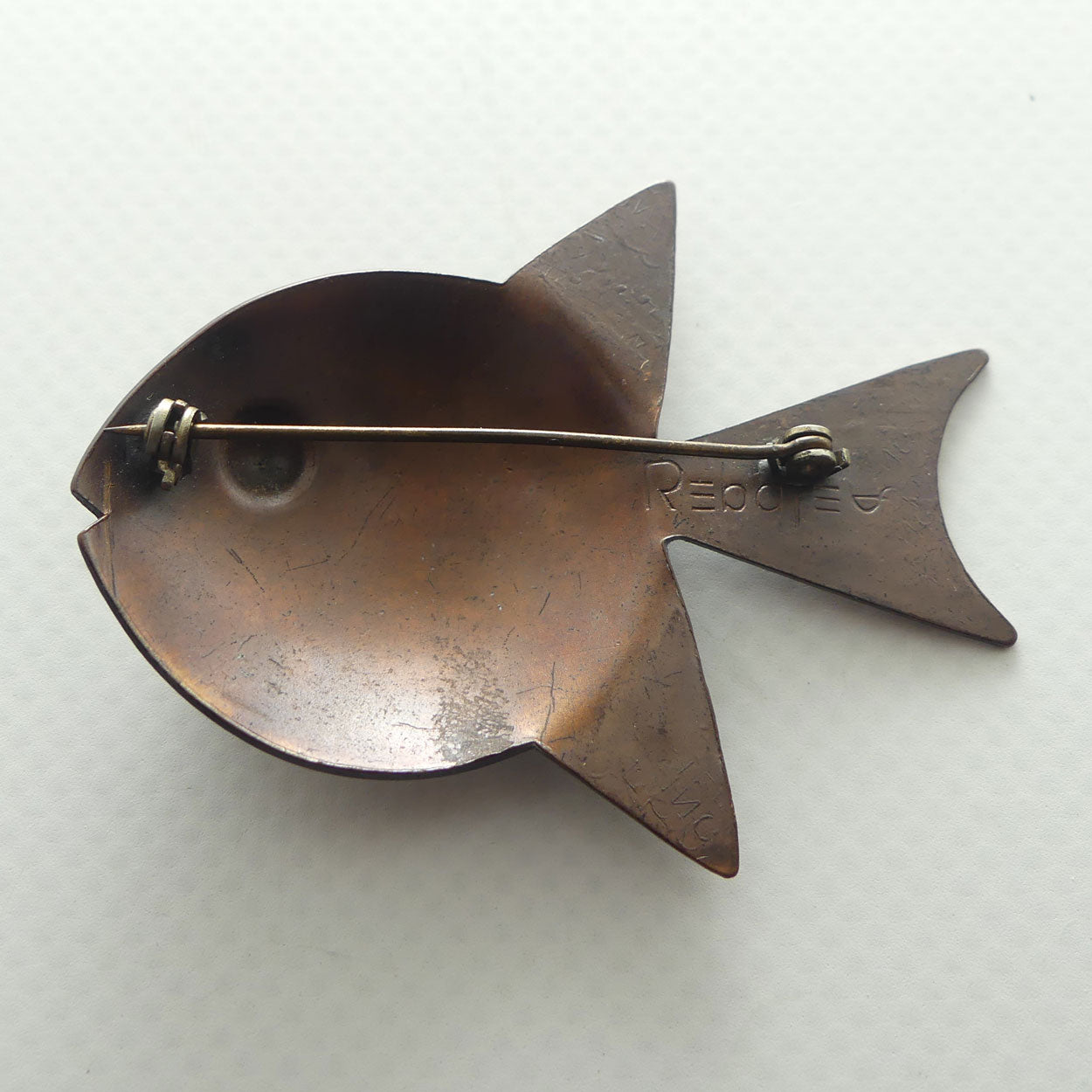 Vintage Mid Century Copper Fish Brooch facing right by Francisco Rebajes