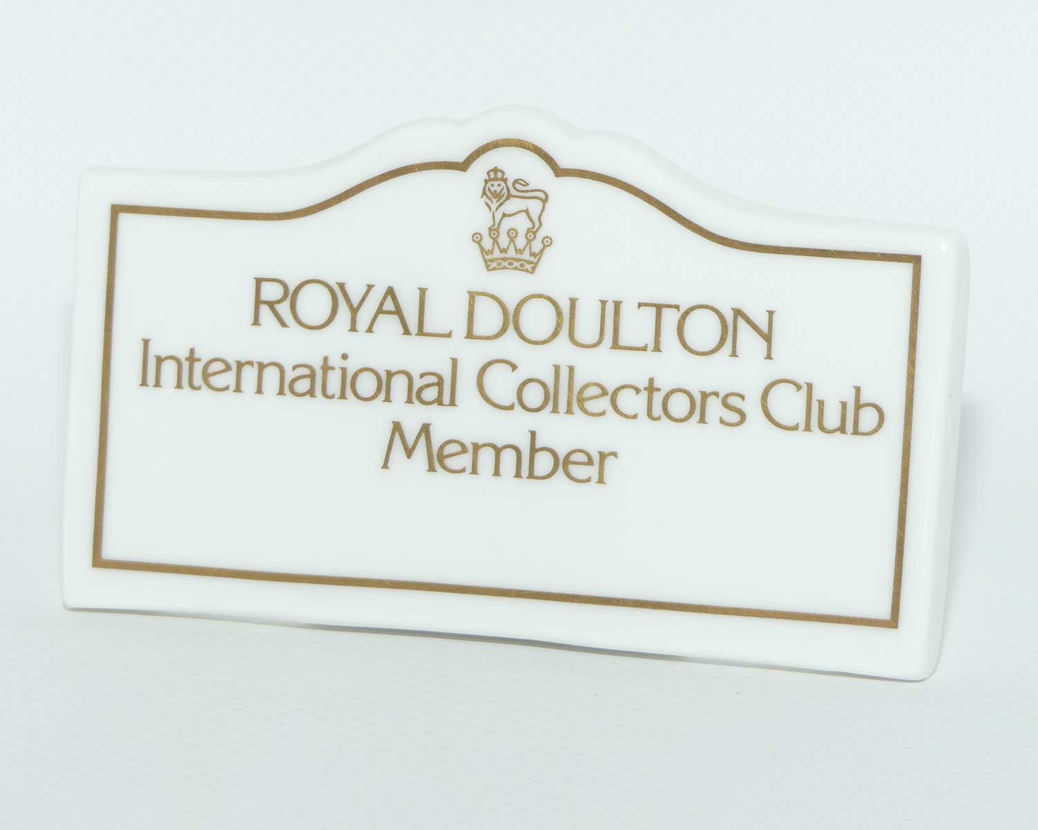 A Royal Doulton International Collectors Club Member rectangular figurine display plaque