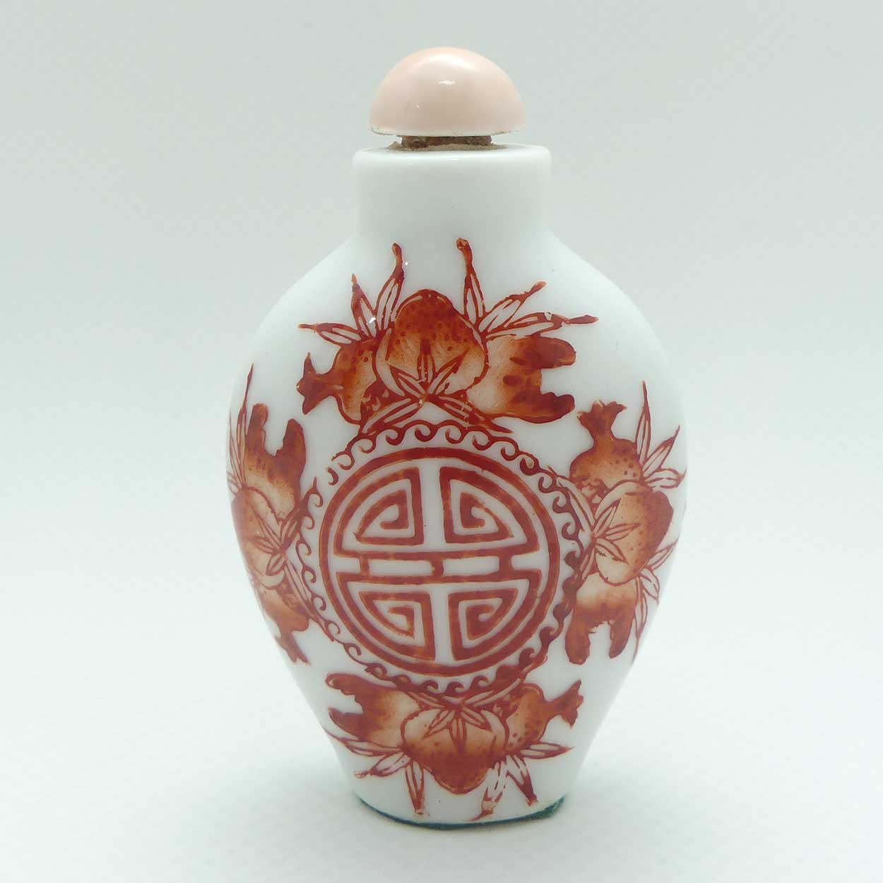 Chinese Red Floral pattern Snuff Bottle | Pink stone stopper