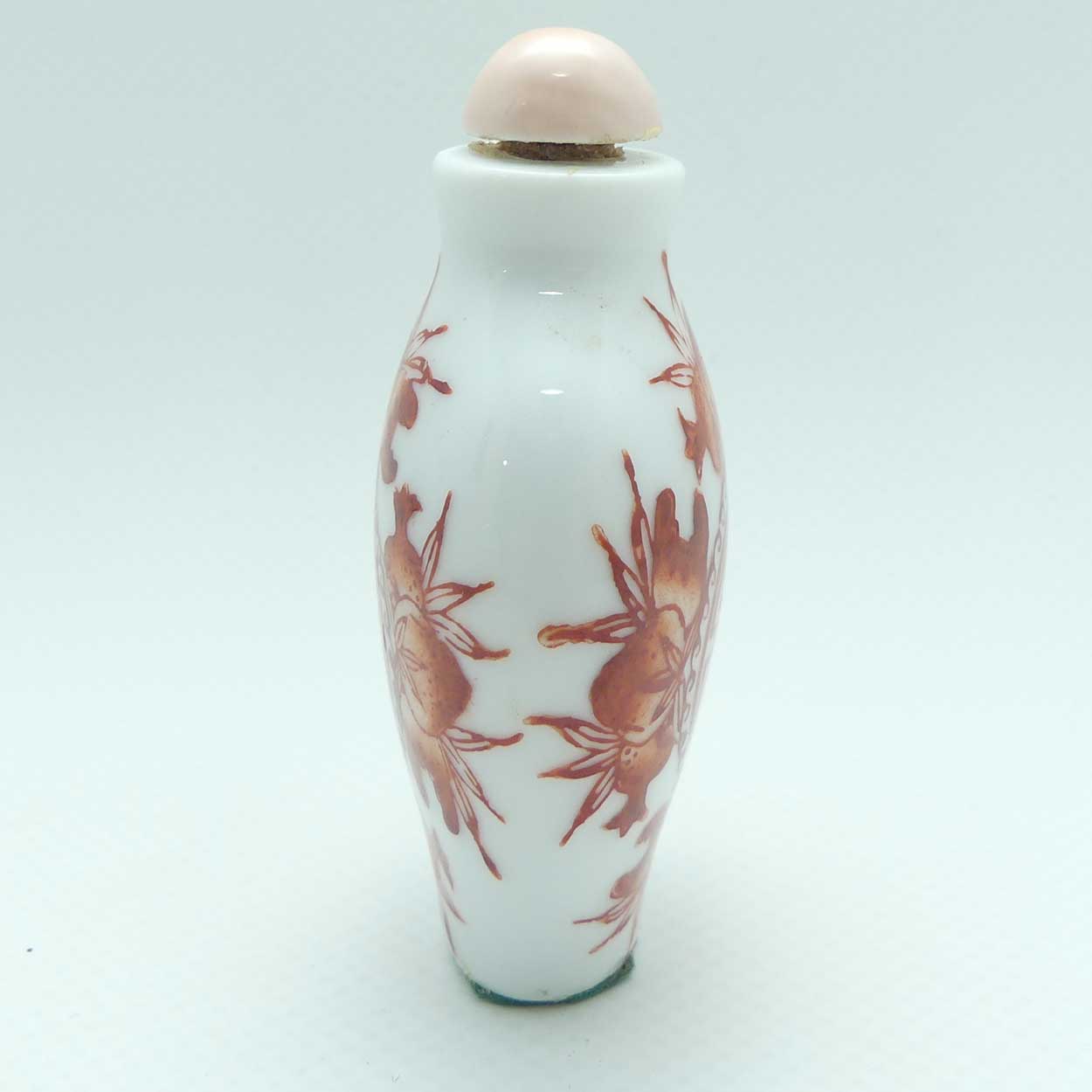 Chinese Red Floral pattern Snuff Bottle | Pink stone stopper
