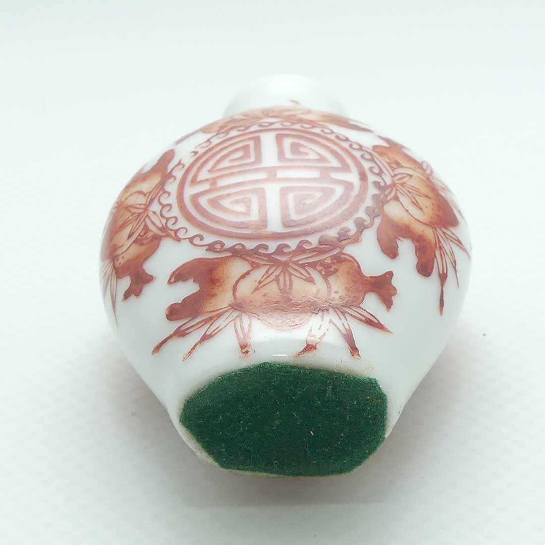 Chinese Red Floral pattern Snuff Bottle | Pink stone stopper