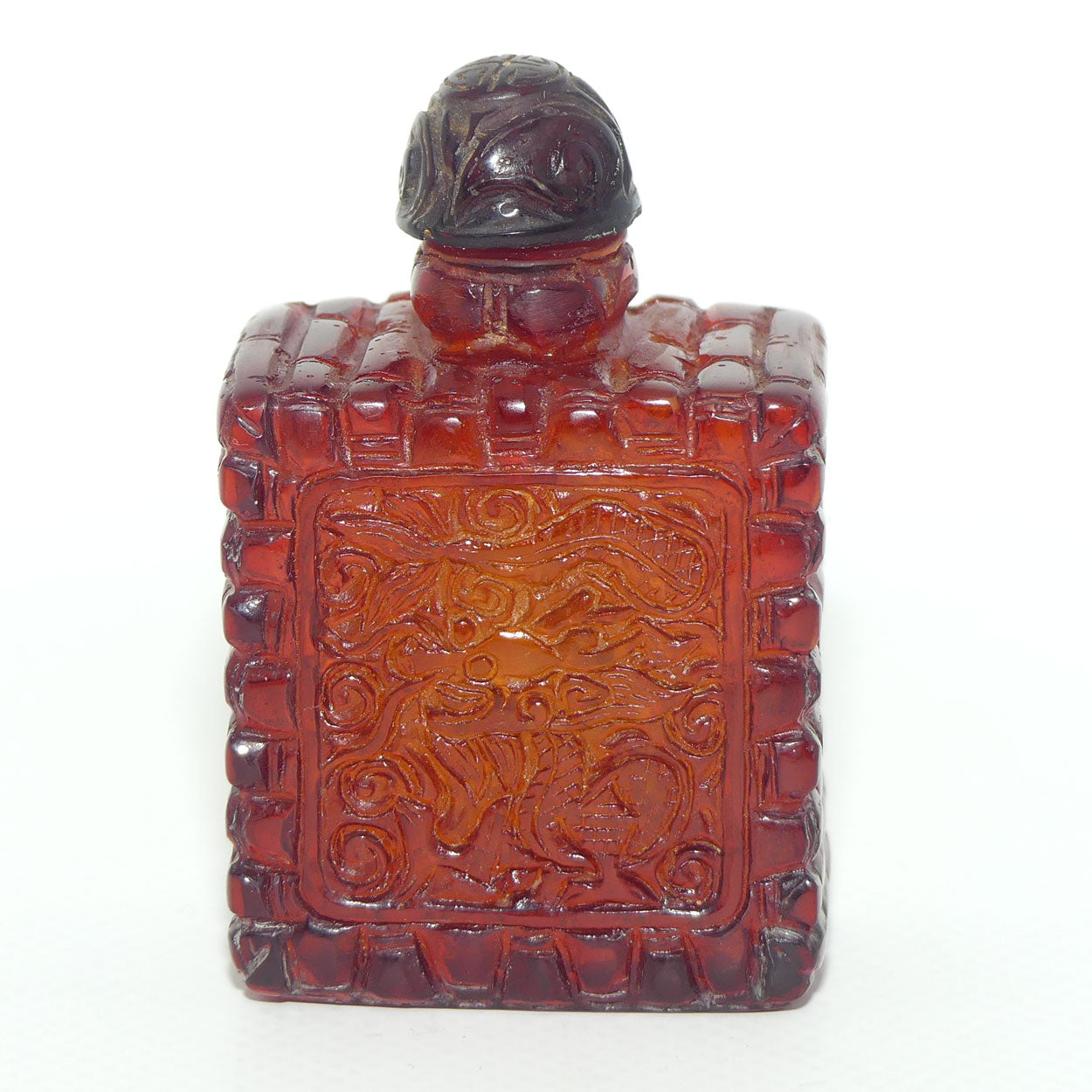Chinese Snuff Bottle | Carved Amber in Square form with Stopper