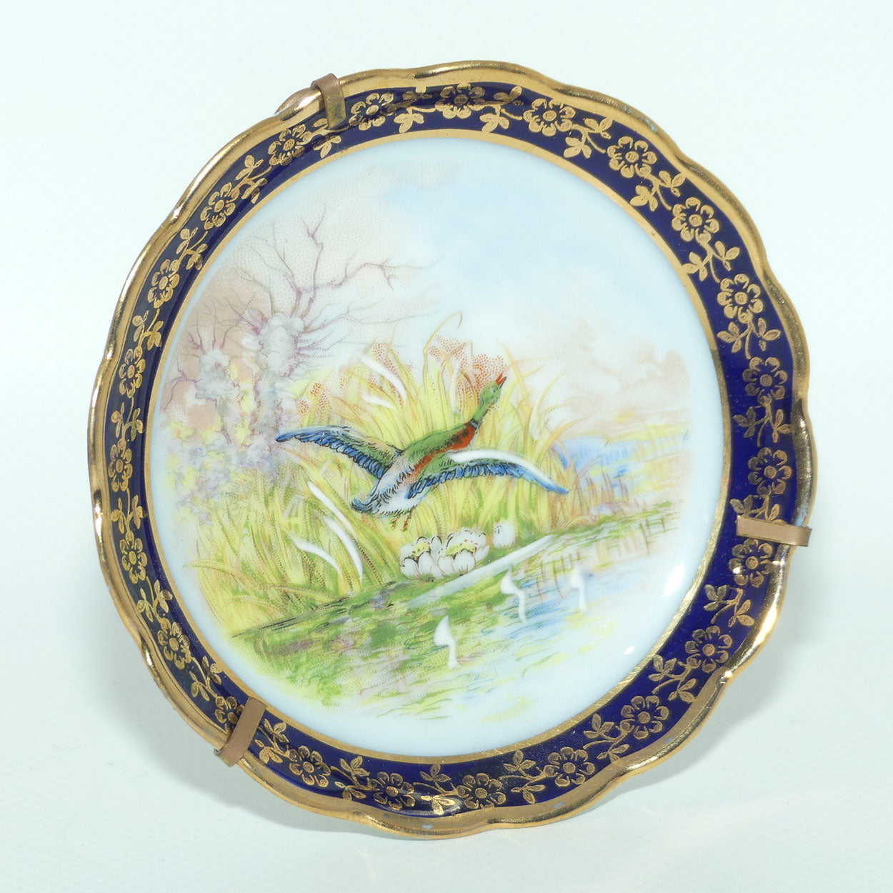 Rehausse Main Limoges France Blue and Gilt border Duck in Flight Scene plate | 9.5cm wide