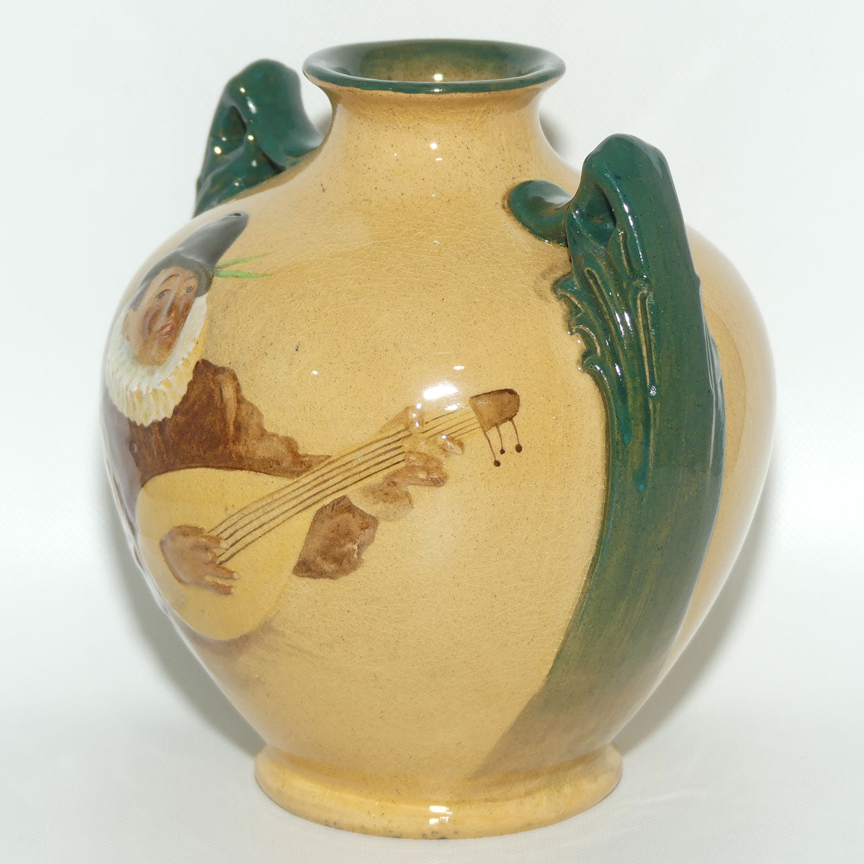 Royal Doulton Rembrandt ware low relief Minstrel vase by Noke