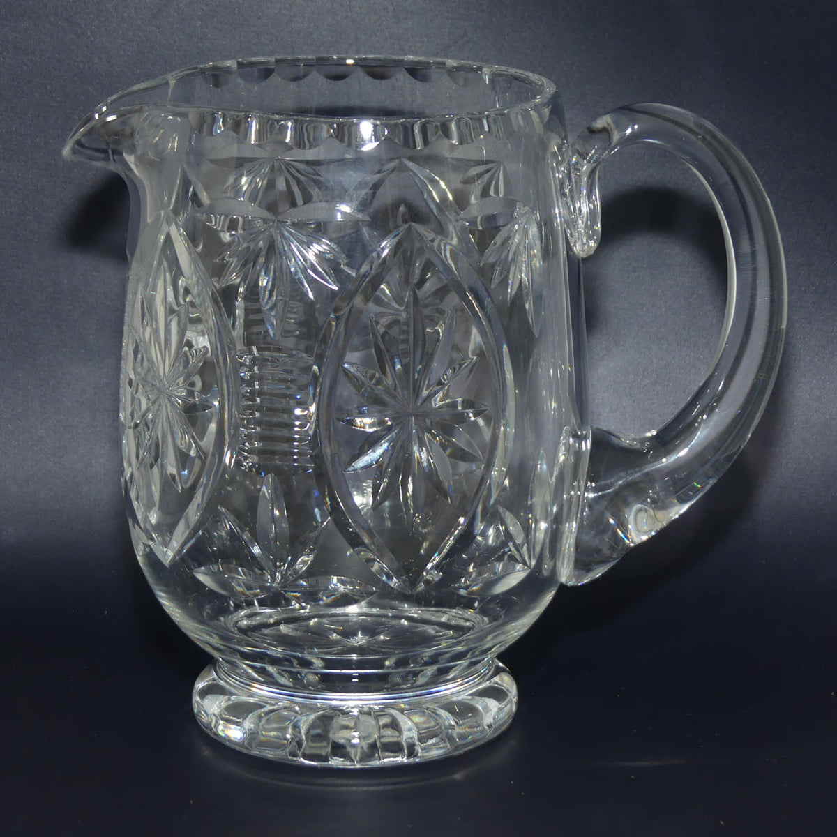Webb Corbett Crystal | Beautifully facetted Star pattern round body Crystal water jug