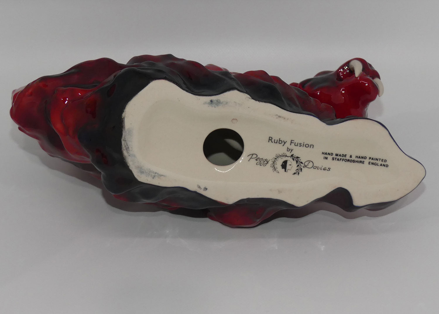 peggy-davies-ceramics-ruby-fusion-glaze-tiger-on-rock-2-white-teeth