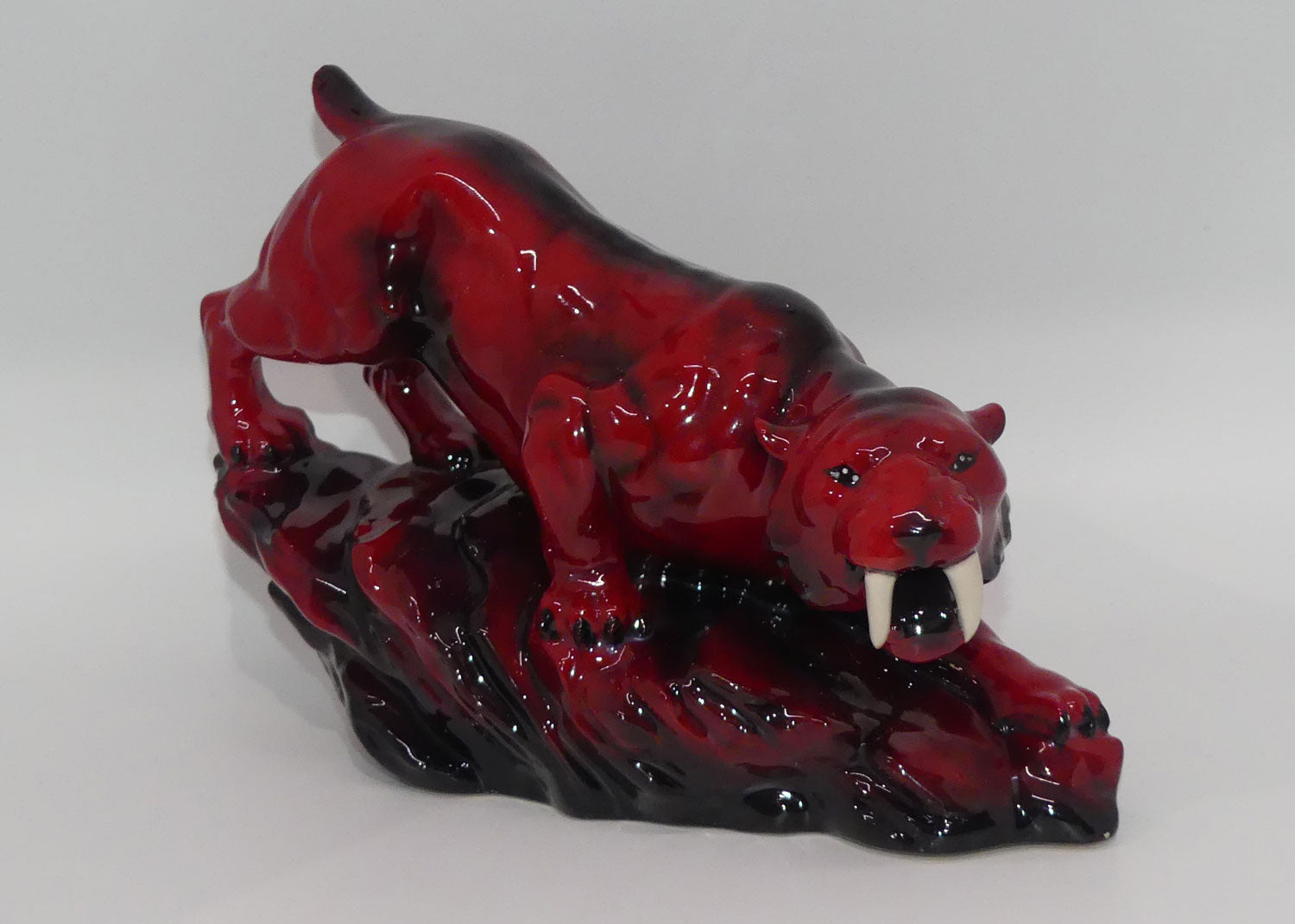 peggy-davies-ceramics-ruby-fusion-glaze-tiger-on-rock-3-white-teeth