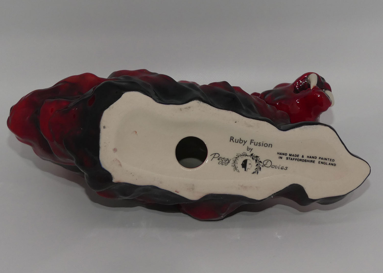 peggy-davies-ceramics-ruby-fusion-glaze-tiger-on-rock-3-white-teeth