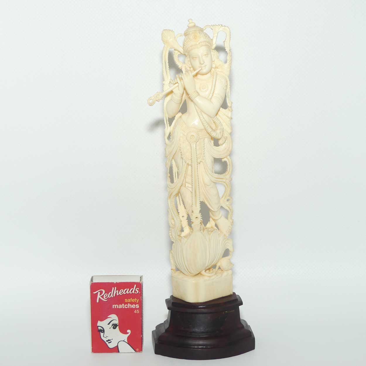 Indian Carved Ivory figure of Krishna, atop a Lotus with Flute | 23.5cm tall
