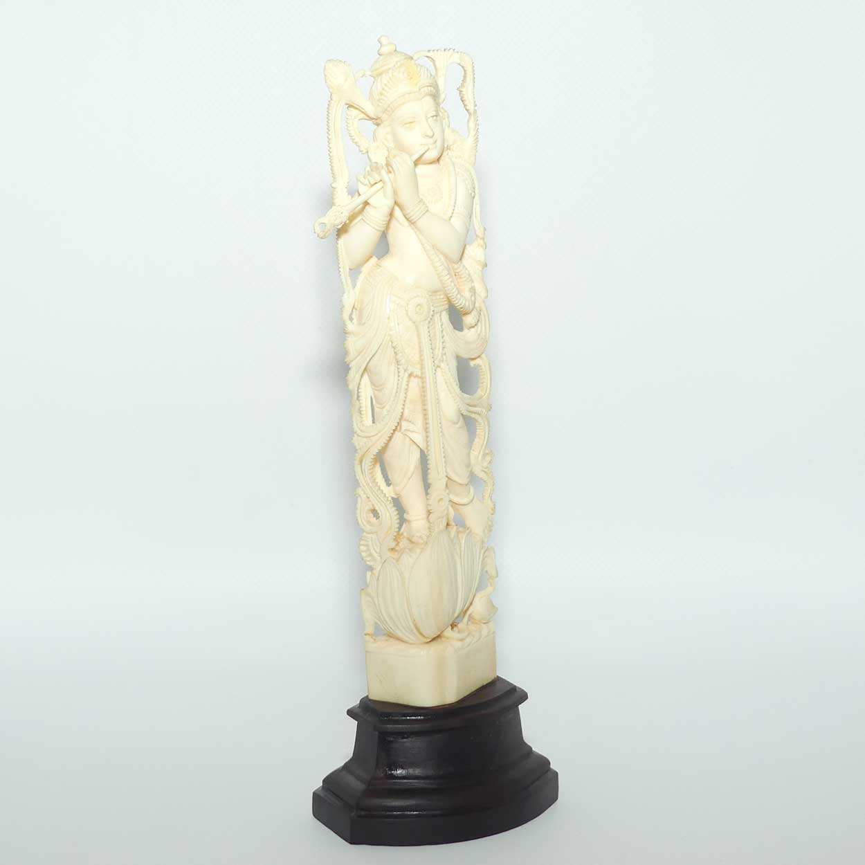 Indian Carved Ivory figure of Krishna, atop a Lotus with Flute | 23.5cm tall