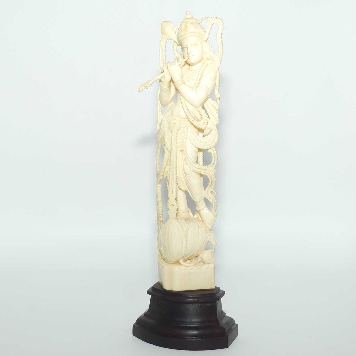 Indian Carved Ivory figure of Krishna, atop a Lotus with Flute | 23.5cm tall