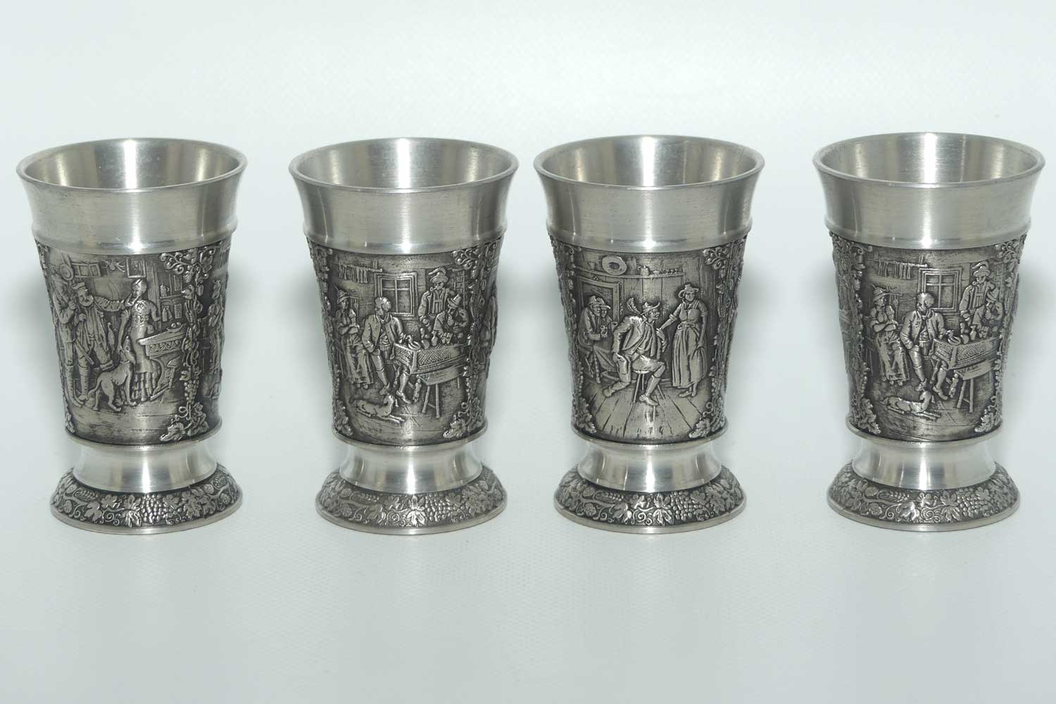 Set of 4 Creation Zinn Pewter well figured shot glasses