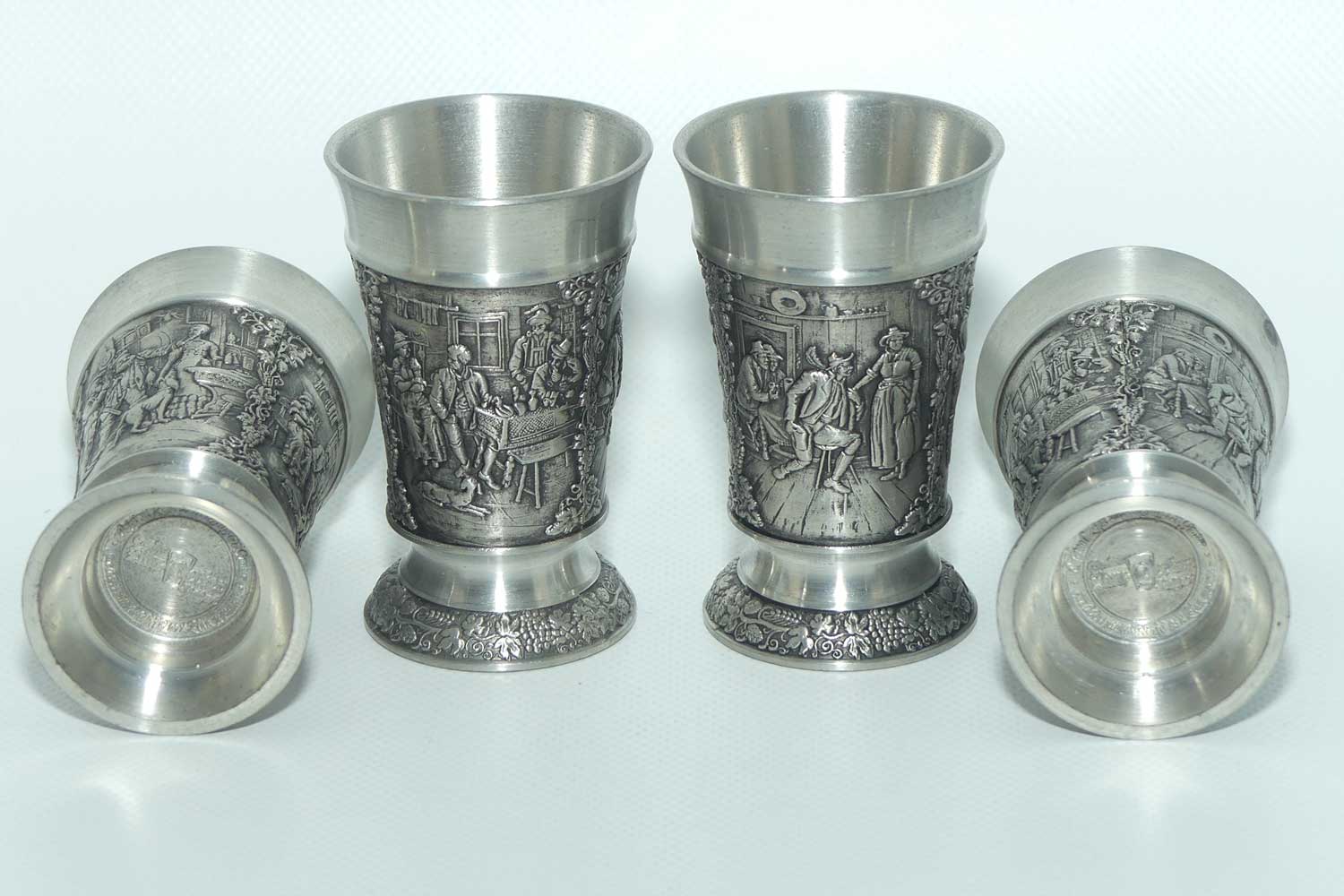 Set of 4 Creation Zinn Pewter well figured shot glasses