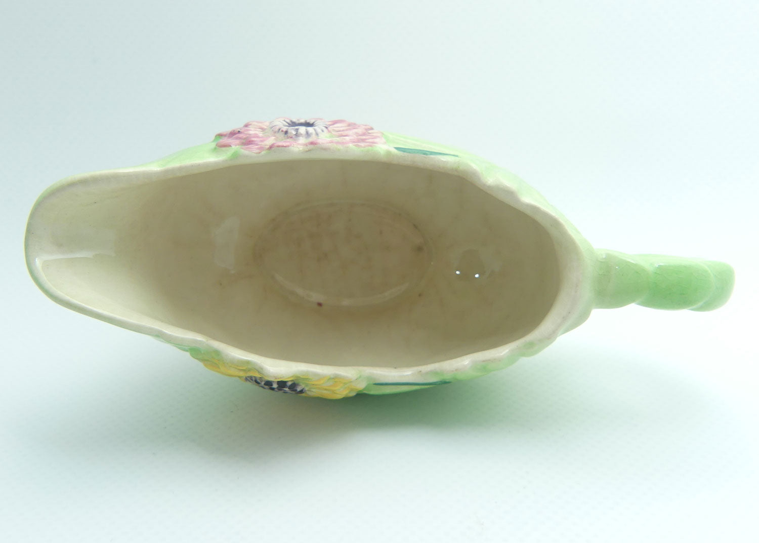 Shorter and Son Staffordshire Floral embossed mayonnaise jug and saucer