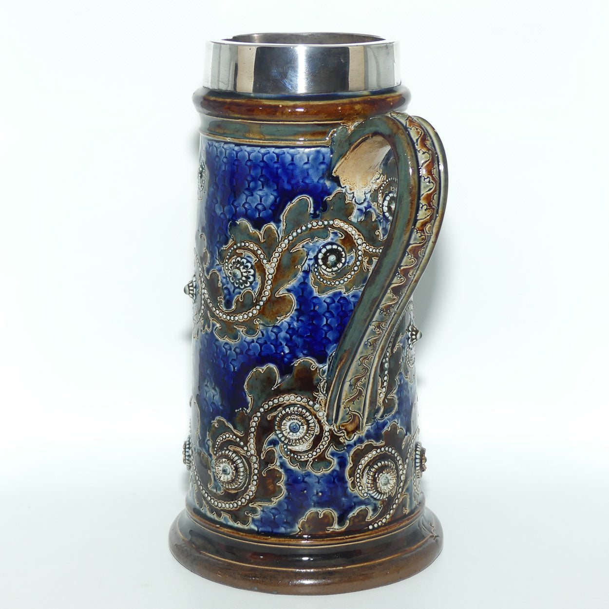 Doulton Lambeth George Tinworth stoneware ale jug with Sterling Silver rim (London 1876)