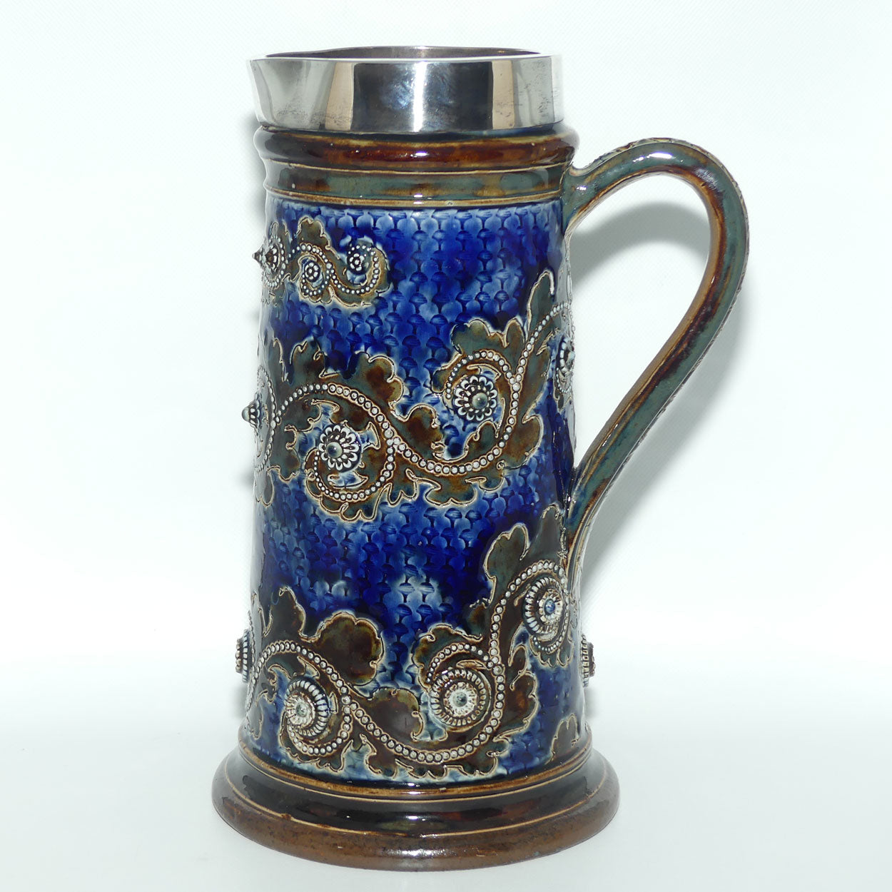 Doulton Lambeth George Tinworth stoneware ale jug with Sterling Silver rim (London 1876)