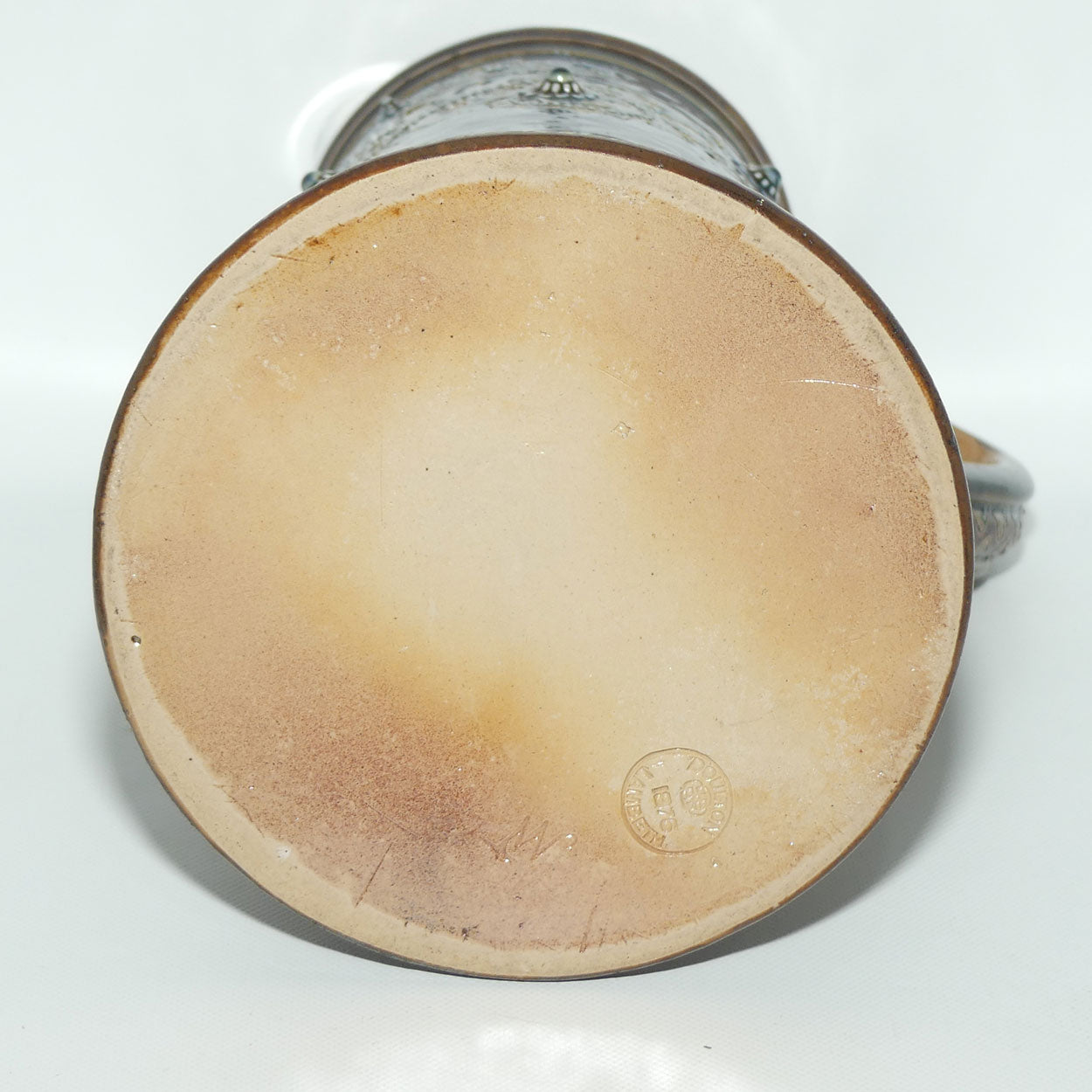 Doulton Lambeth George Tinworth stoneware ale jug with Sterling Silver rim (London 1876)