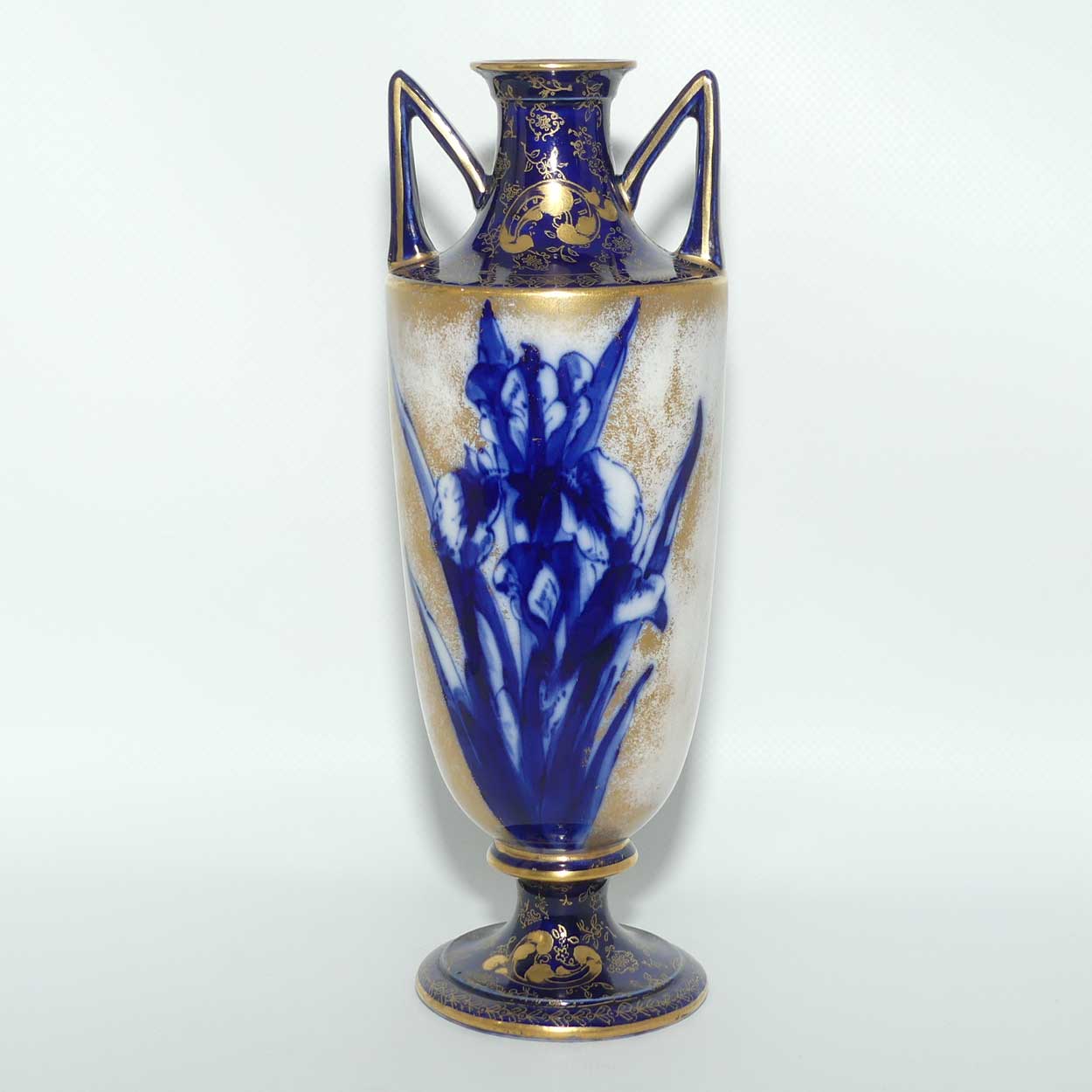Doulton Burslem Blue Iris and Daffodil tall slender vase with twin handles and gilt highlights