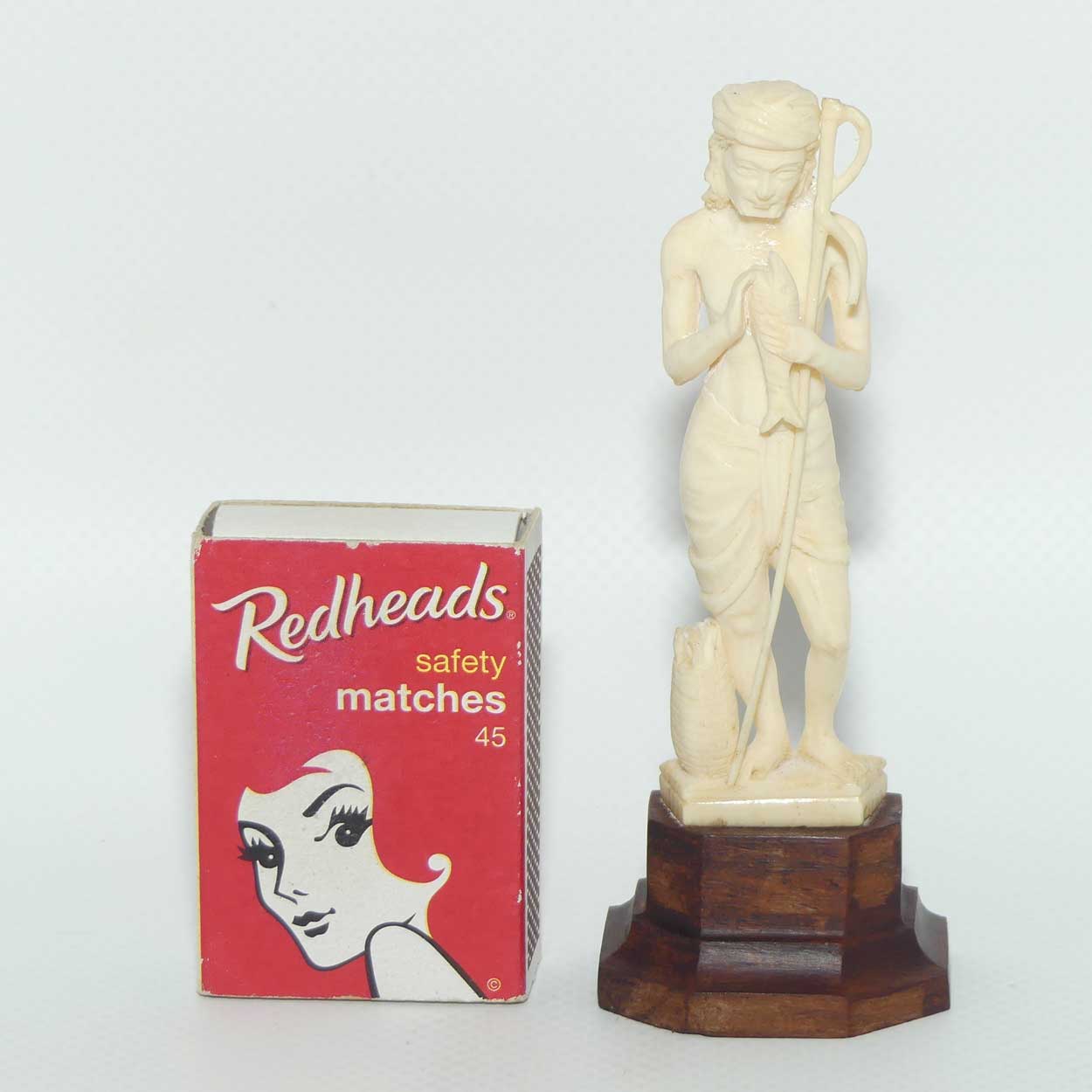 Carved Ivory Figure on Rosewood base | Fisherman | 10.5cm