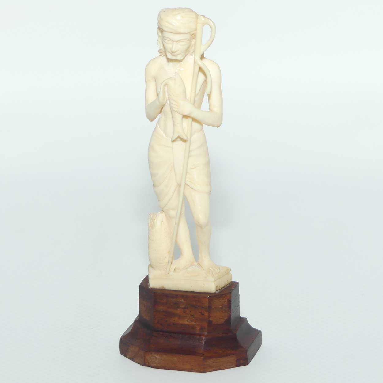 Carved Ivory Figure on Rosewood base | Fisherman | 10.5cm