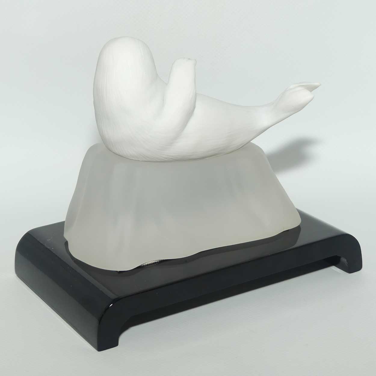 Franklin Mint | Snow Pup figure on base and plinth | Humane Society