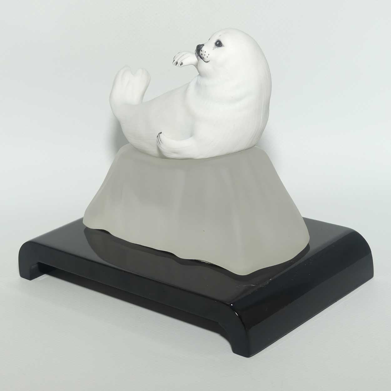 Franklin Mint | Snow Pup figure on base and plinth | Humane Society