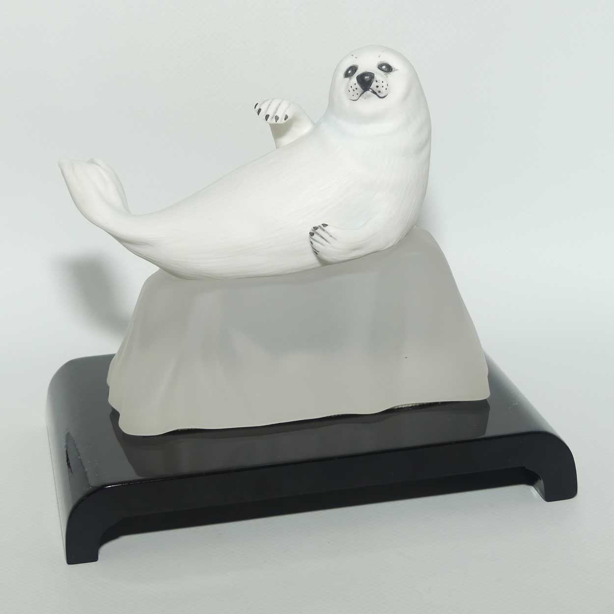 Franklin Mint | Snow Pup figure on base and plinth | Humane Society