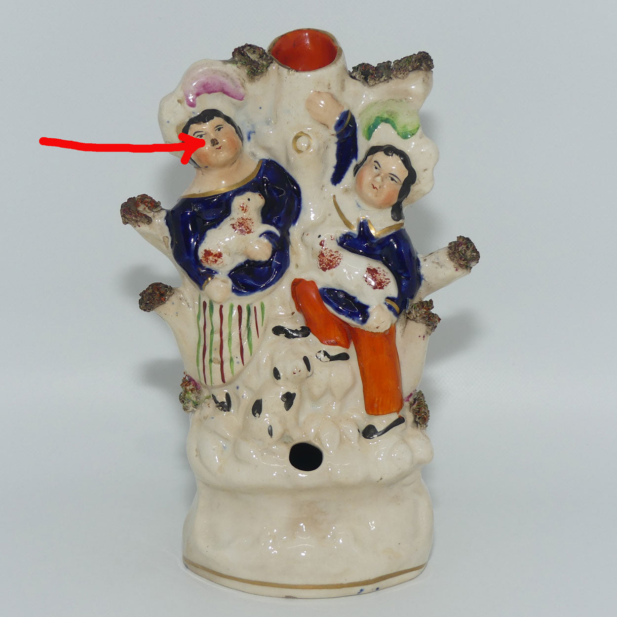 antique-staffordshire-figural-vase-couple-nursing-dogs-c-1860