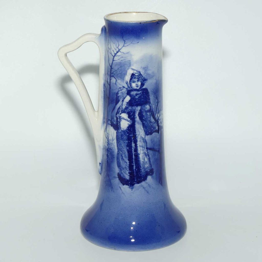 Royal Doulton Blue Children tall jug (Woman in Snowstorm)