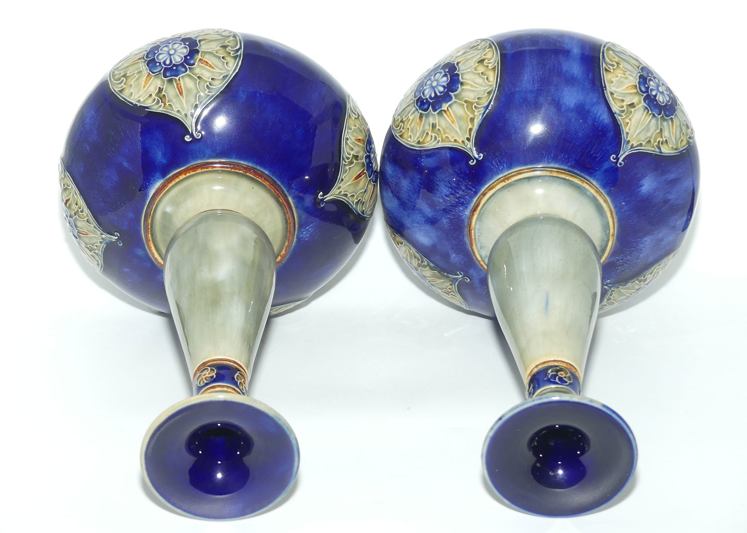 Royal Doulton stoneware pair of tall bulbous vases with applied floral rosettes