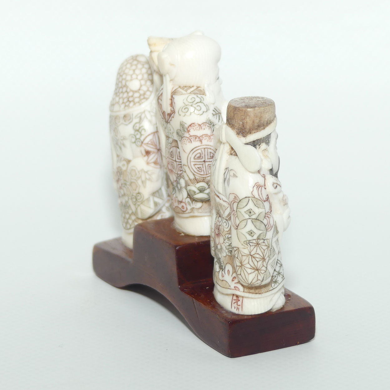 Japanese Carved Ivory Okimono figure on wooden base | Three Dieties | Meiji period | signed