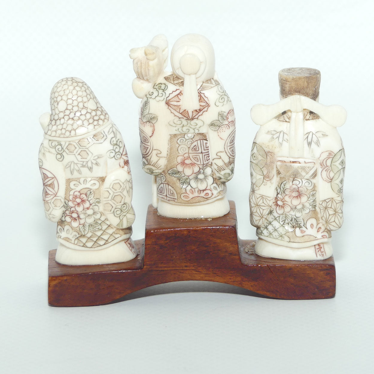 Japanese Carved Ivory Okimono figure on wooden base | Three Dieties | Meiji period | signed