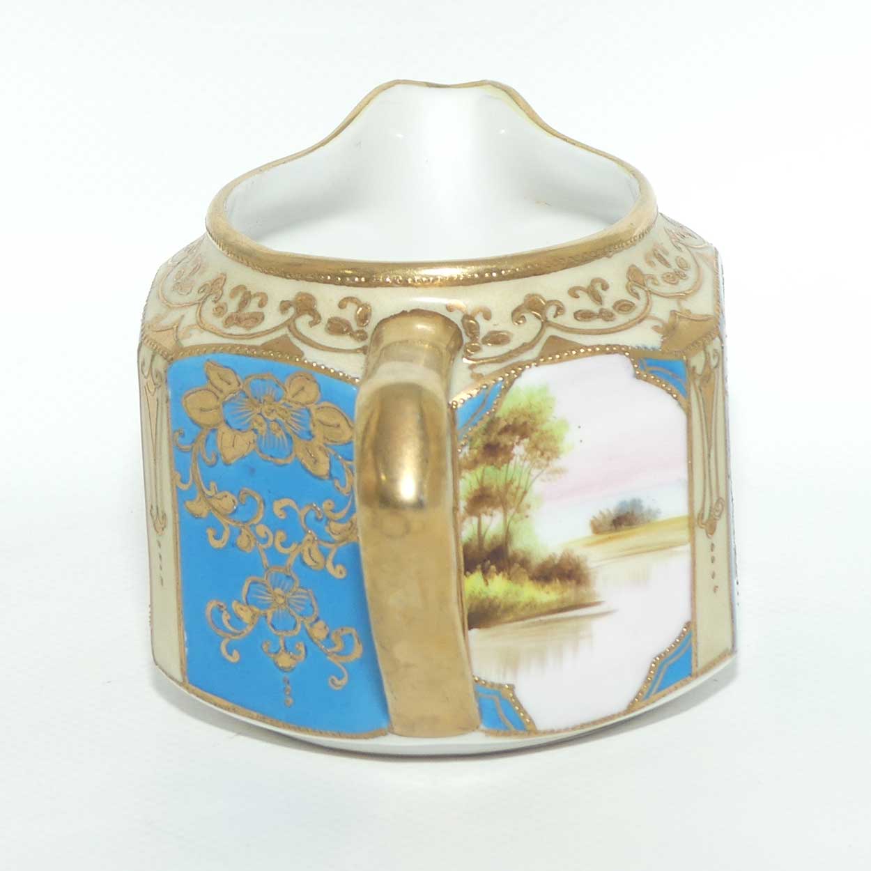 early Noritake Hand Painted and Gilt decorated Blue ground milk and sugar | Hexagonal shape | Lake Scene