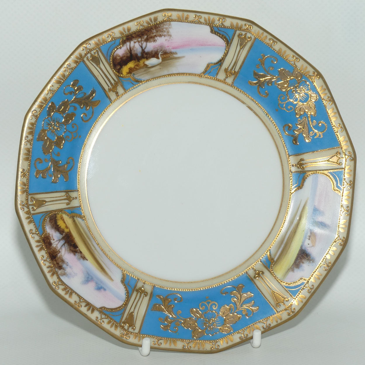 Early Noritake Hand Painted and Gilt decorated Blue ground tea trio | #1 | Lake Scene