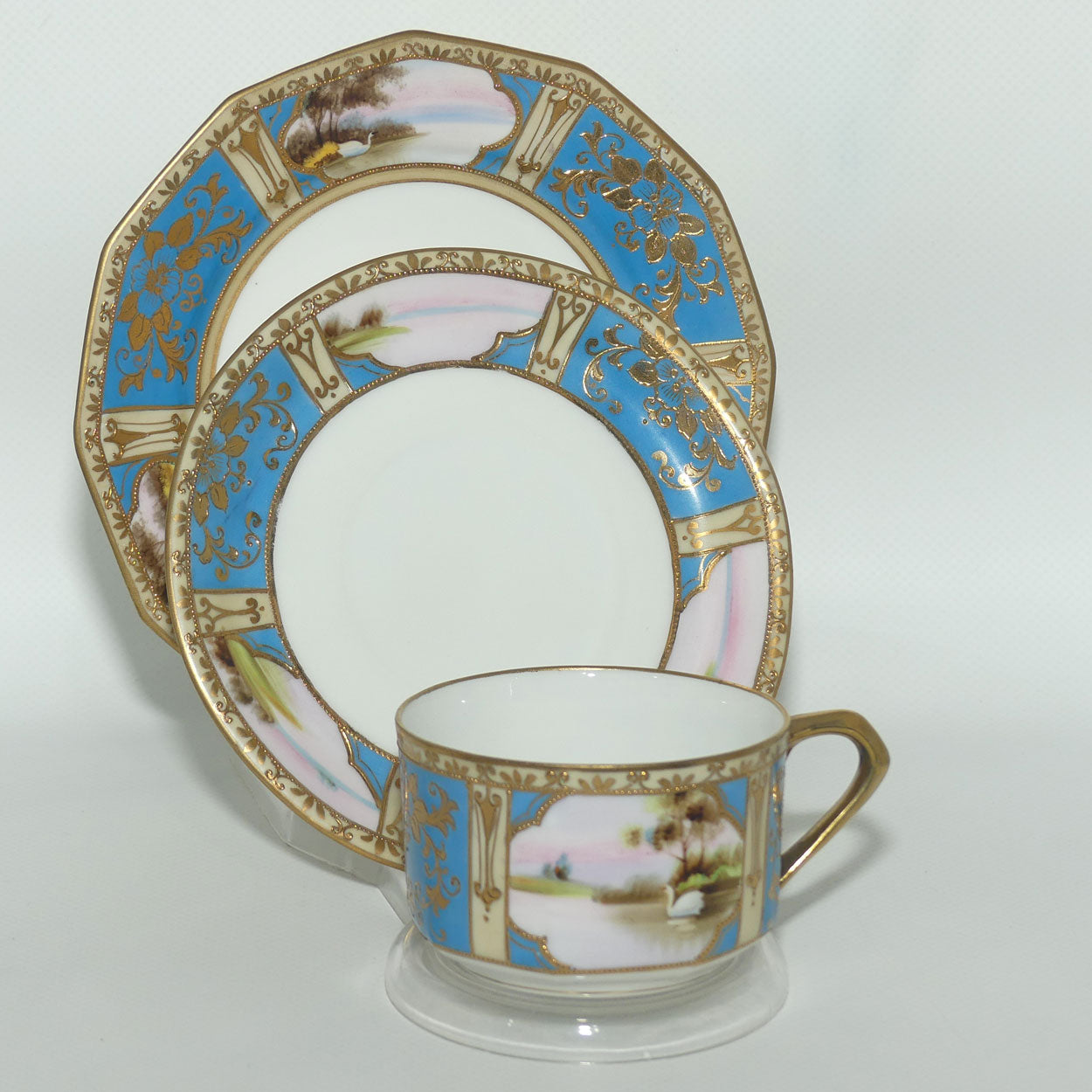 Early Noritake Hand Painted and Gilt decorated Blue ground tea trio | #2 | Lake Scene