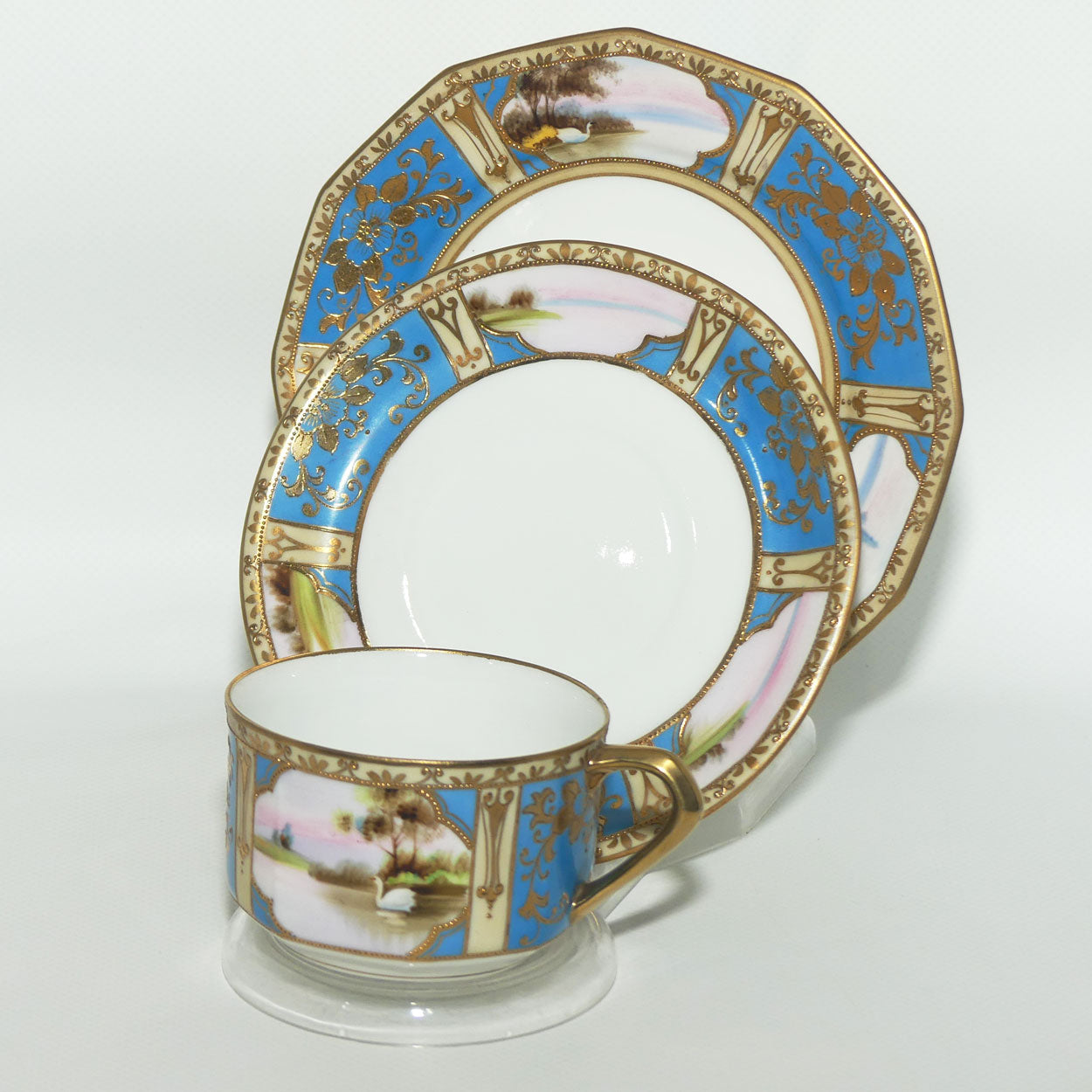 Early Noritake Hand Painted and Gilt decorated Blue ground tea trio | #2 | Lake Scene