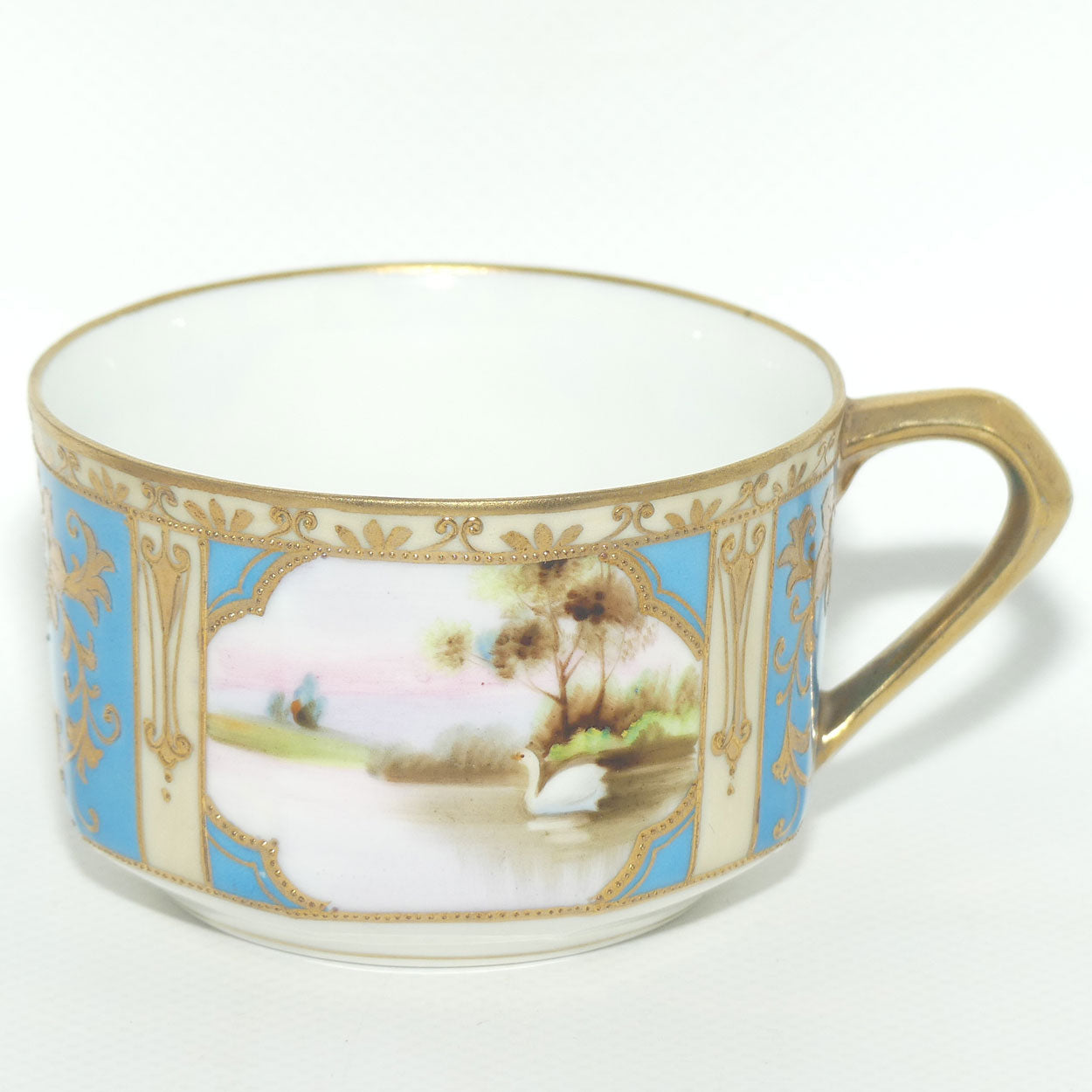 Early Noritake Hand Painted and Gilt decorated Blue ground tea trio | #2 | Lake Scene