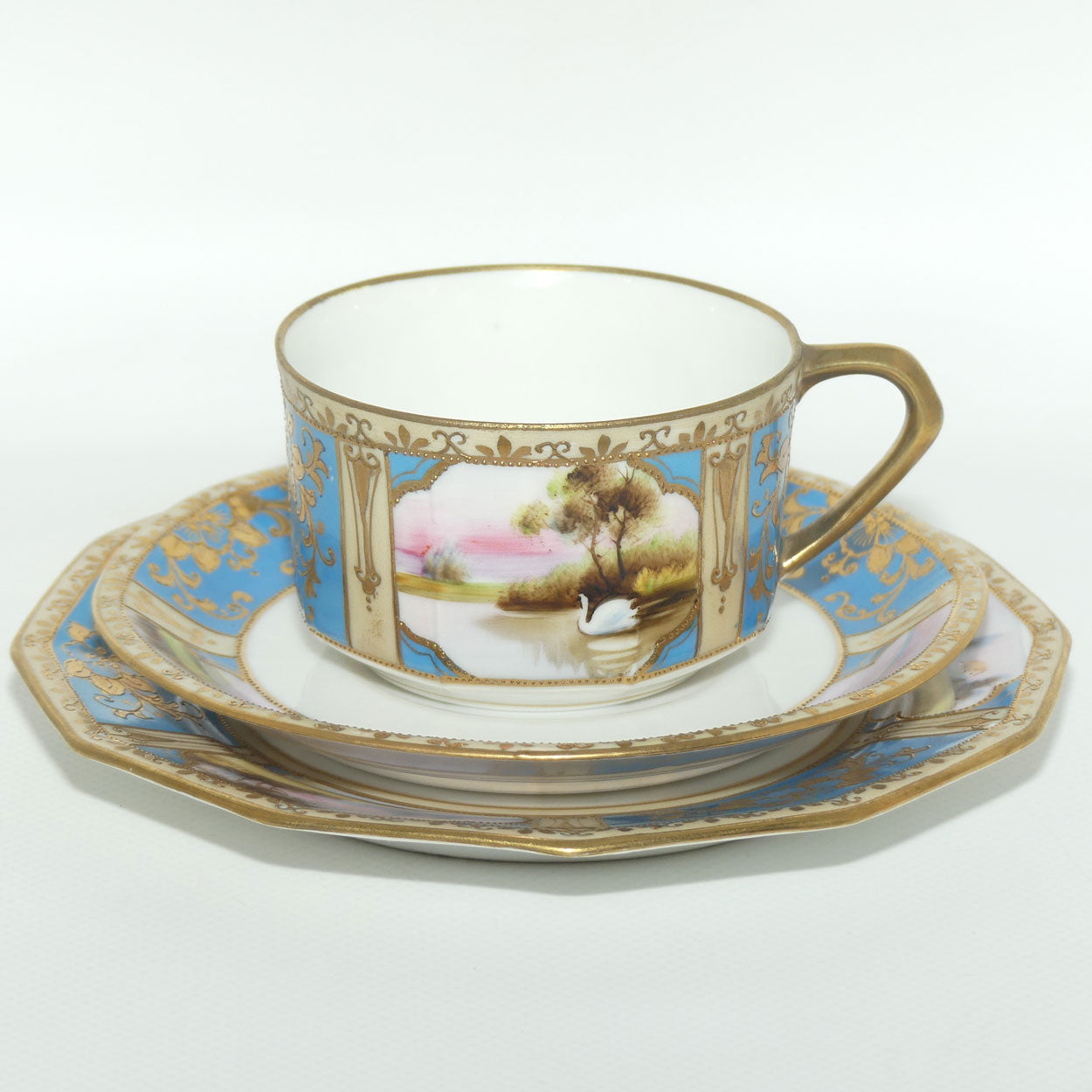 Early Noritake Hand Painted and Gilt decorated Blue ground tea trio | #3 | Lake Scene
