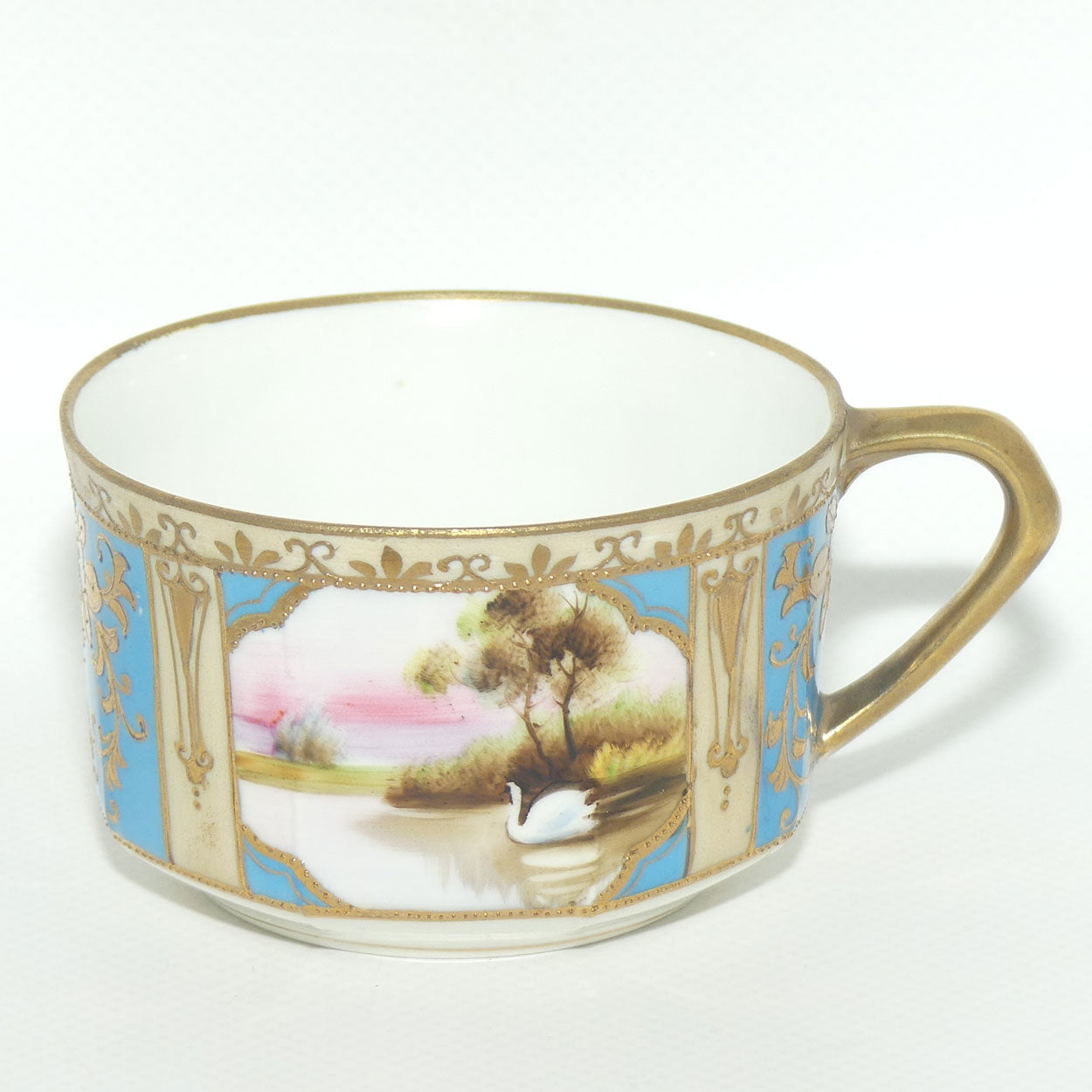 Early Noritake Hand Painted and Gilt decorated Blue ground tea trio | #3 | Lake Scene