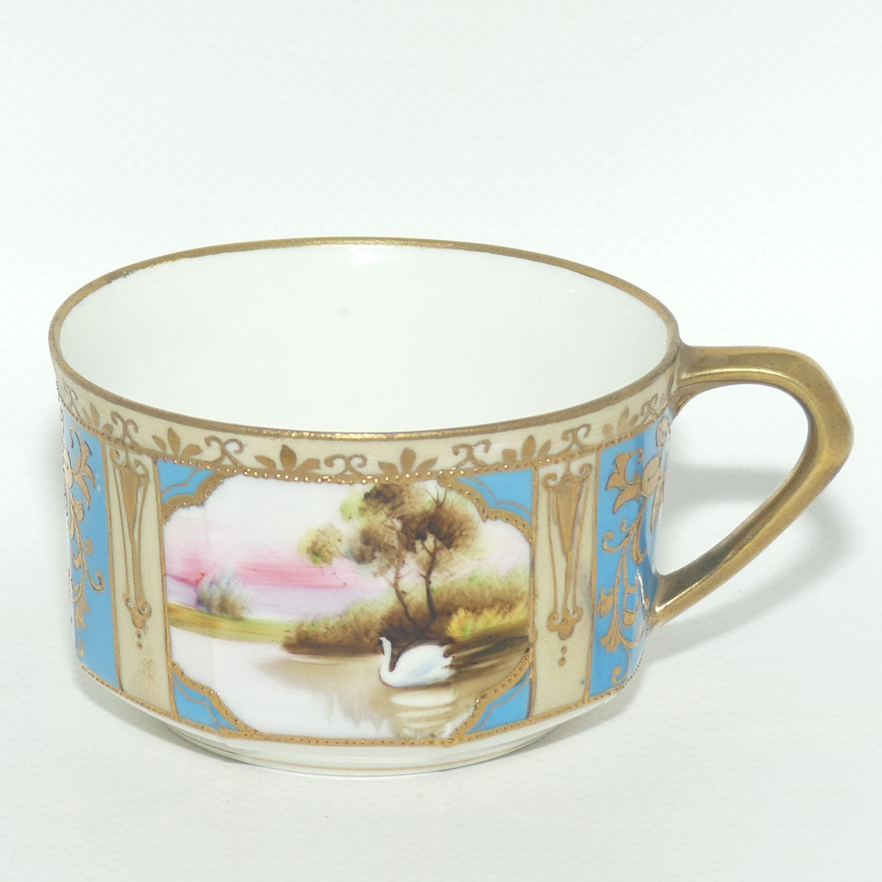 Early Noritake Hand Painted and Gilt decorated Blue ground tea trio | #3 | Lake Scene