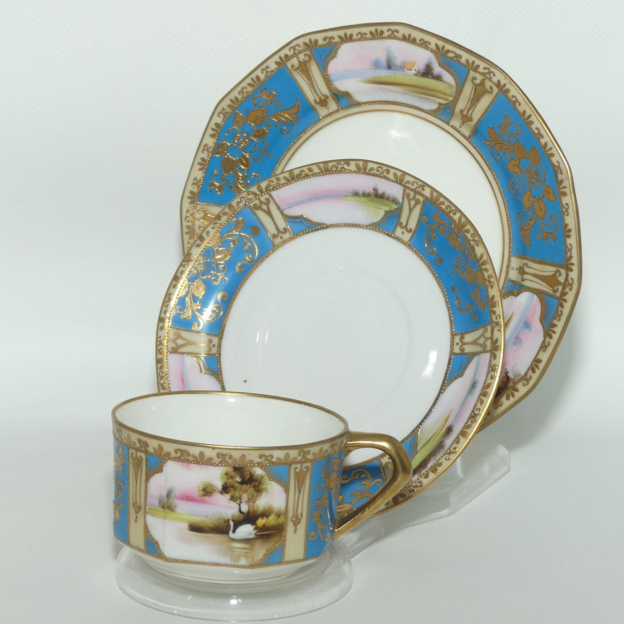 Early Noritake Hand Painted and Gilt decorated Blue ground tea trio | #4 | Lake Scene