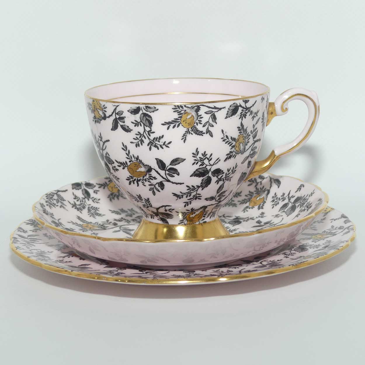 Tuscan Fine English Bone China Black and Gilt Floral trio