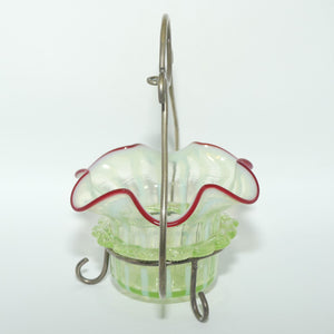 Victorian era Uranium Glass bowl with applied rigaree and Ruby edge in silver plated stand