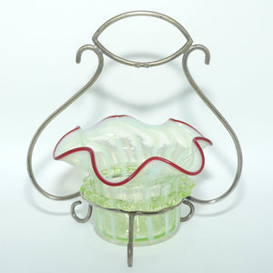 Victorian era Uranium Glass bowl with applied rigaree and Ruby edge in silver plated stand