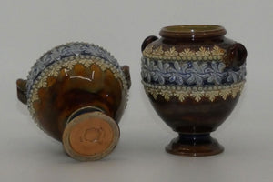Doulton Lambeth stoneware pair of handled and footed urns (#4505)