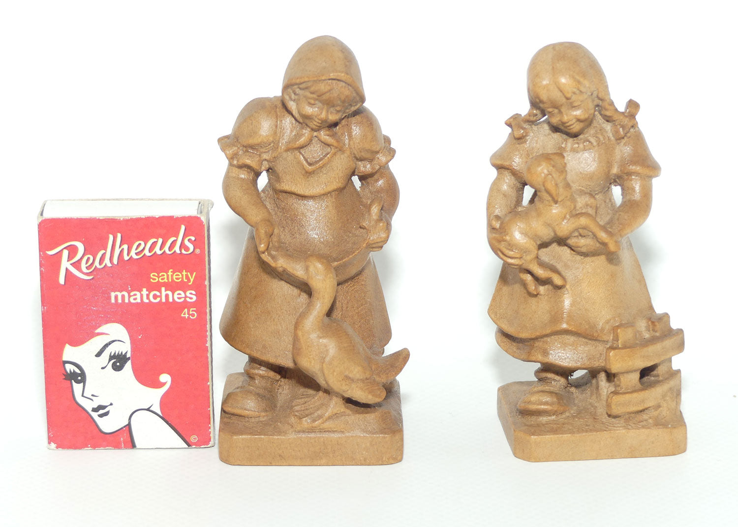 Pair of Wooden finely carved figures of Farm girls | Swiss | by Walter Stahli