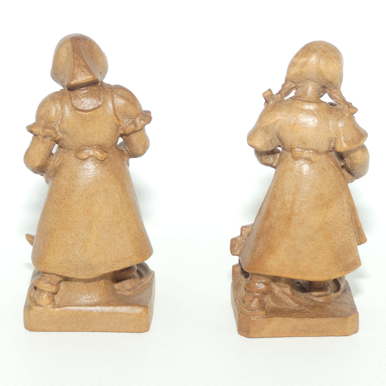 Pair of Wooden finely carved figures of Farm girls | Swiss | by Walter Stahli