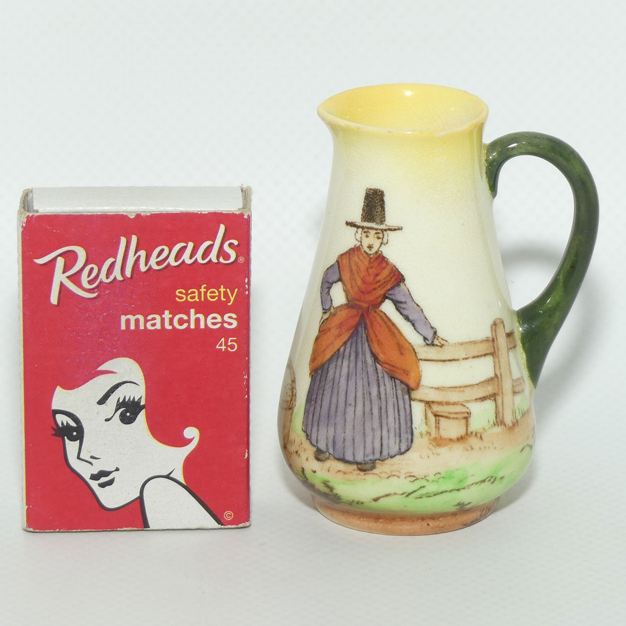 Royal Doulton Welsh miniature jug | Lady with Basket at Fence